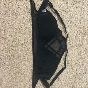 Black bathing suit top with mesh.